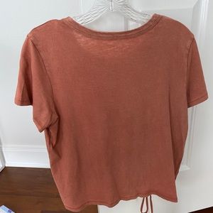 aerie. size medium. t shirt with tie at bottom